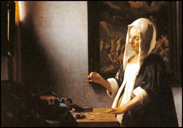 A woman holding a balance, Vermeer